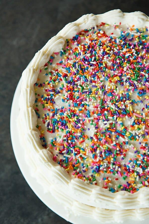 Copycat Dairy Queen Ice Cream Cake - Layers of chocolate ice cream, hot fudge, chocolate crunchies and vanilla ice cream! | browneyedbaker.com