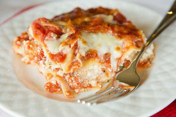 Classic Lasagna Recipe - Layers upon layers of noodles, sauce and lots of cheese! | browneyedbaker.com