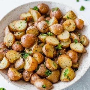 A bowl of roasted red potatoes.