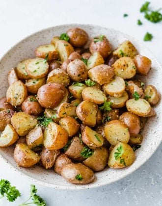 A bowl of roasted red potatoes.