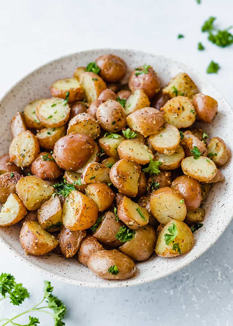 A bowl of roasted red potatoes.