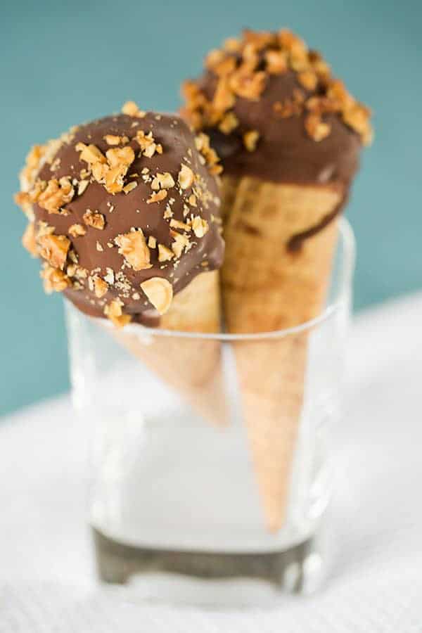DIY: Homemade Drumsticks... Complete with a chocolate-coated sugar cone filled with vanilla ice cream, dipped in chocolate and rolled in peanuts! | browneyedbaker.com