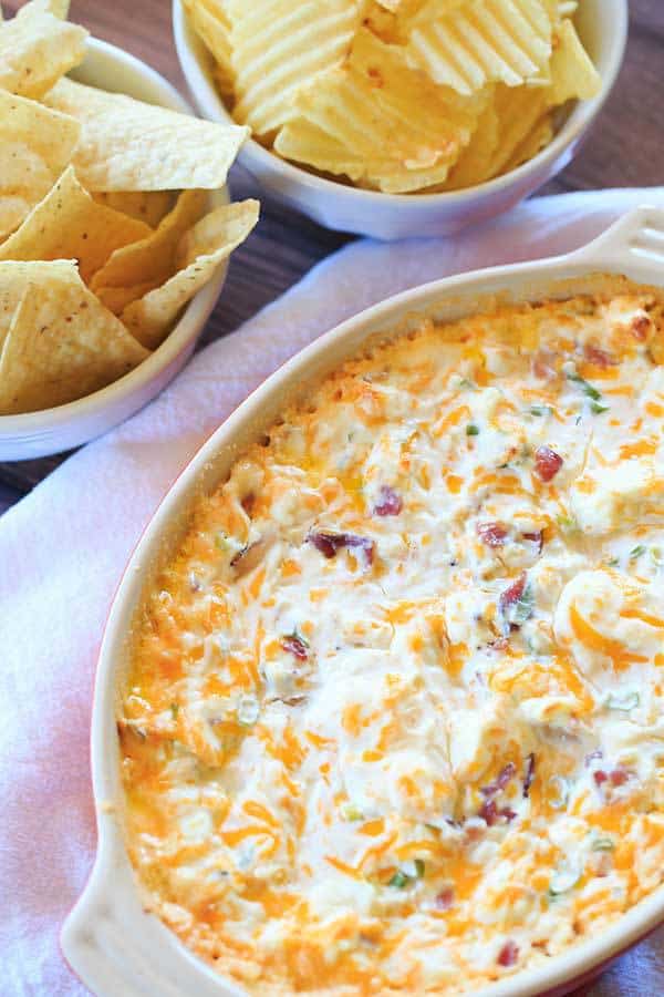 Warm and Cheesy Bacon Dip - A hot version of the popular Loaded Baked Potato Dip! | https://www.browneyedbaker.com/warm-cheesy-bacon-dip/