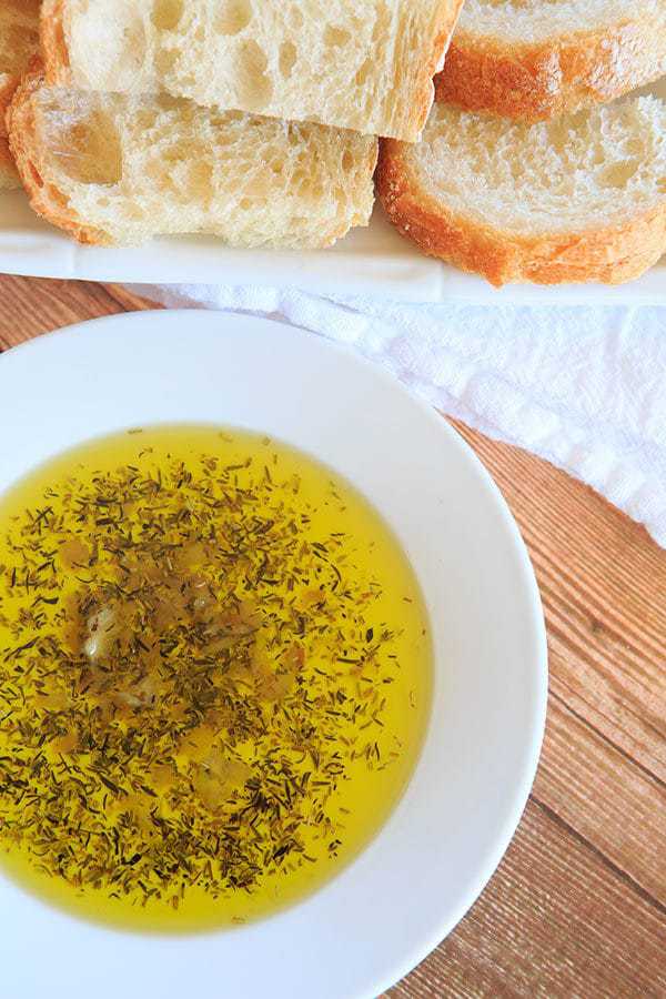 Roasted Garlic & Herb Dipping Oil - Perfect with a loaf of crusty Italian bread! | browneyedbaker.com