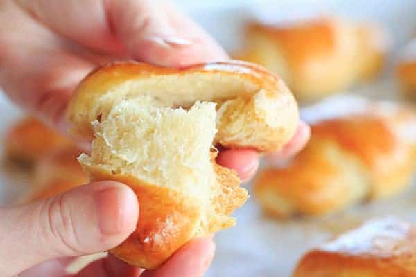 These homemade crescent rolls are flaky, buttery and easier than you'd think. They are the perfect accompaniment to any holiday meal! | https://www.browneyedbaker.com/homemade-crescent-rolls/