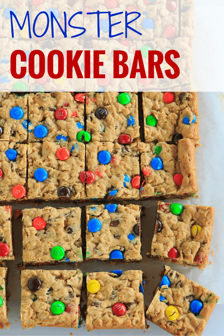 Monster Cookie Bars - Peanut butter dough is loaded with oats, chocolate chips and M&M's. | https://www.browneyedbaker.com/monster-cookie-bars/