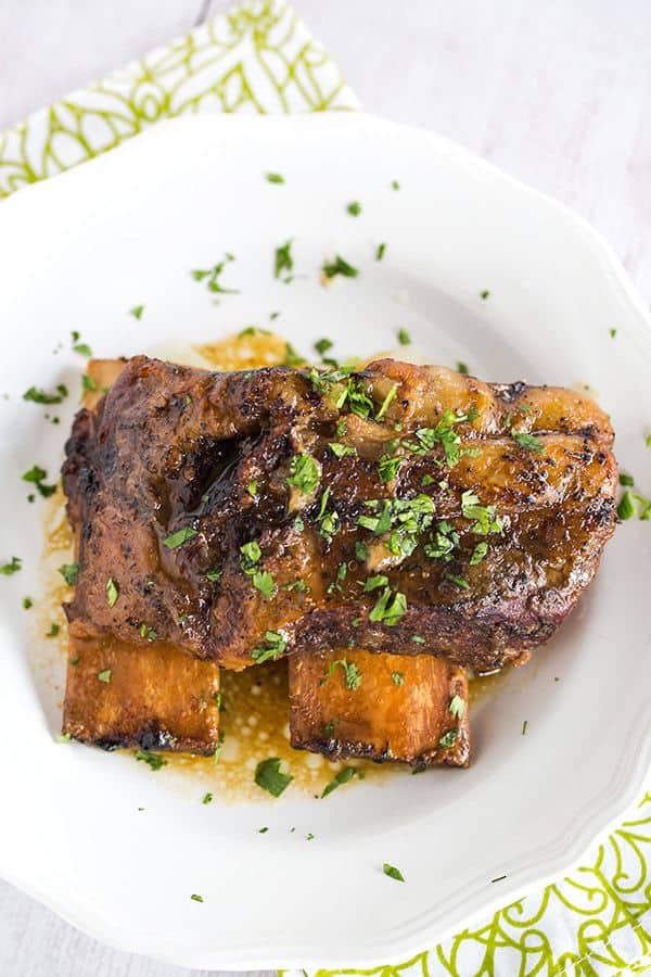 Slow Cooker Korean Short Ribs are an easy, set it and forget it meal that is full of amazing flavor and tender, falling apart meat! | browneyedbaker.com