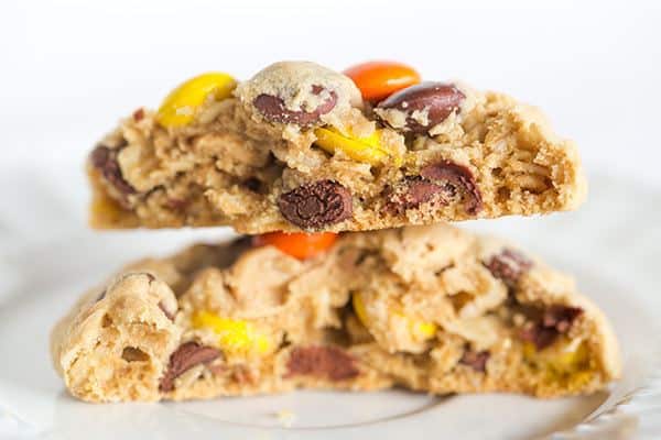 Peanut Butter Lover's Monster Cookies - A peanut butter dough loaded with oats, chocolate chips, peanut butter chips and Reese's Pieces! Go bake these NOW! | browneyedbaker.com
