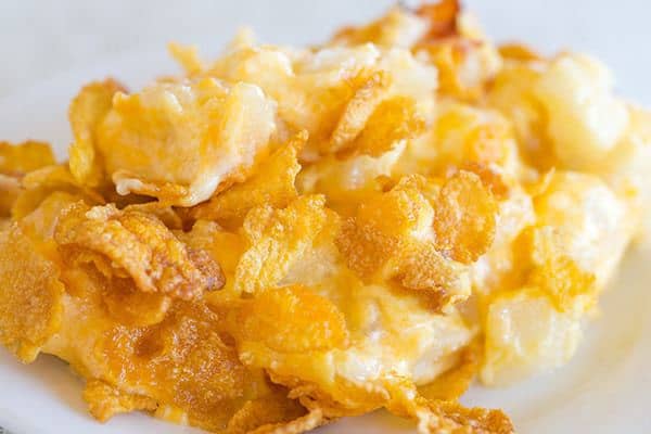 This easy potato casserole is creamy, cheesy and topped with crunchy Corn Flakes.