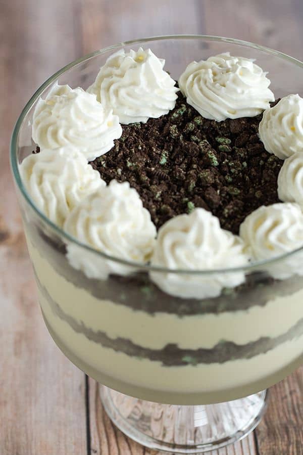 Baileys White Chocolate Mousse - Spiked white chocolate mousse layered into a trifle dish with crushed mint Oreos. An easy dessert for your St. Patrick's Day celebration!