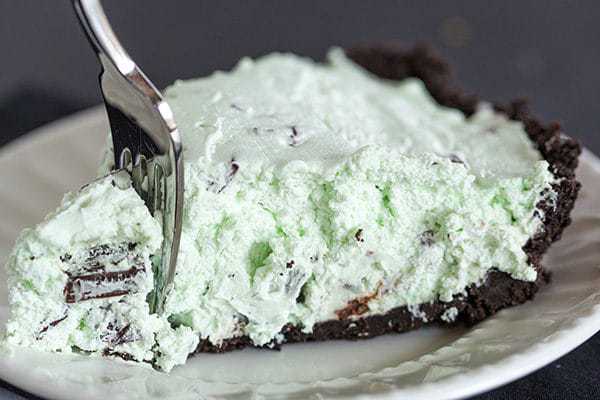 Mint Chocolate Chip Pie - This no-bake pie comes together quickly and is perfect for chocolate and mint lovers. Make it for a St. Patrick's Day celebration!