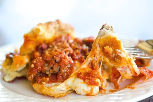 Deep Dish Biscuit Pizza - All of the amazing flavor of a traditional deep dish pizza without a shortcut biscuit crust. Great for a quick pizza night!