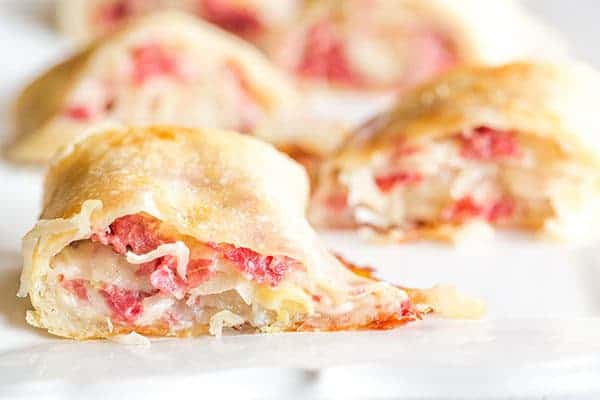These reuben rolls feature pizza crust stuffed with corned beef, Swiss cheese, sauerkraut and a caraway-seed dressing. They will disappear in a matter of minutes!
