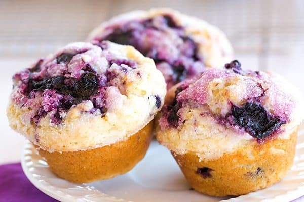 These blueberry muffins are loaded with fresh blueberries, have a fresh blueberry jam swirl throughout and are topped with sugar for a crunchy bite!