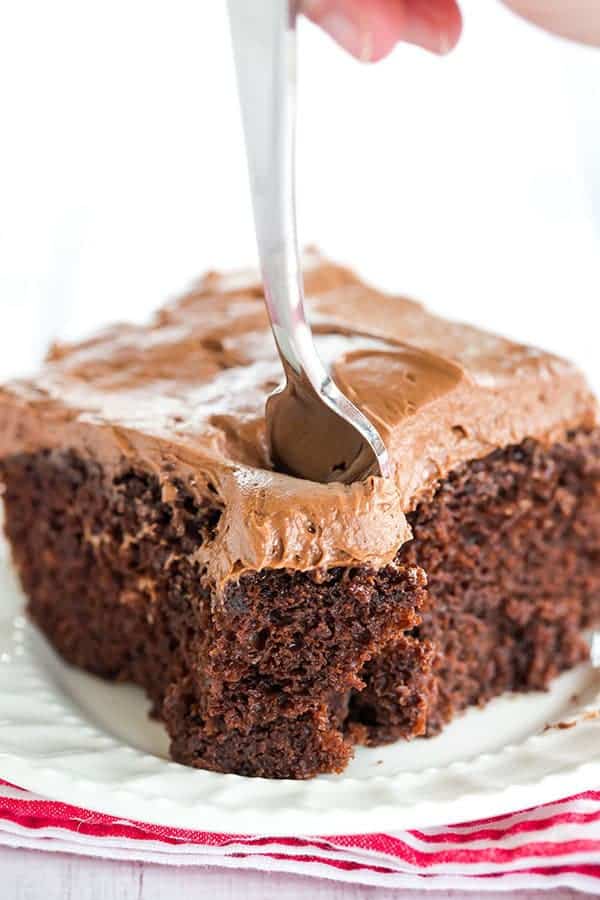 Chocolate Dump-It Cake: An old-fashioned recipe for chocolate cake mixed together in one pot, topped with a tangy cream cheese-chocolate frosting.