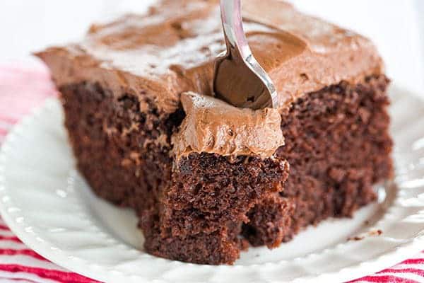 Chocolate Dump-It Cake: An old-fashioned recipe for chocolate cake mixed together in one pot, topped with a tangy cream cheese-chocolate frosting.