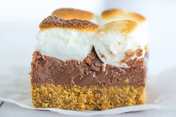 These s'mores bars boast a thick graham crust, a fudgy milk chocolate layer, and are topped with toasted marshmallows, of course!