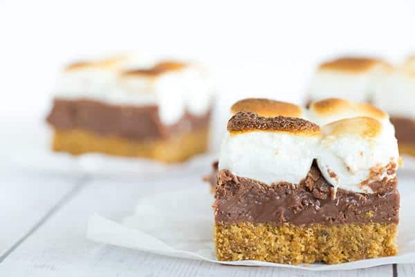 These s'mores bars boast a thick graham crust, a fudgy milk chocolate layer, and are topped with toasted marshmallows, of course!