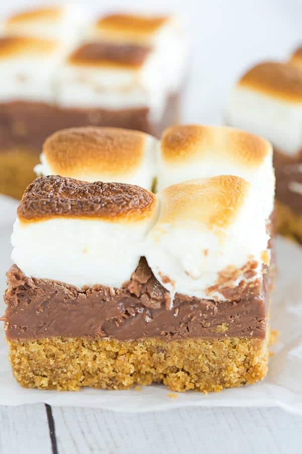 These s'mores bars boast a thick graham crust, a fudgy milk chocolate layer, and are topped with toasted marshmallows, of course!