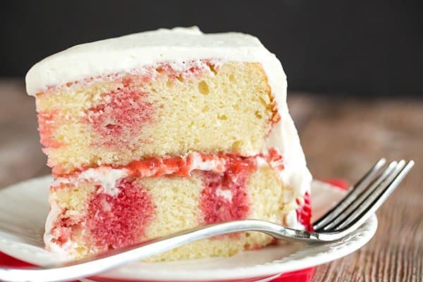 Strawberry Poke Cake - A two-layer beauty with the most amazing fresh sweet whipped cream. A perfect summer celebration cake!