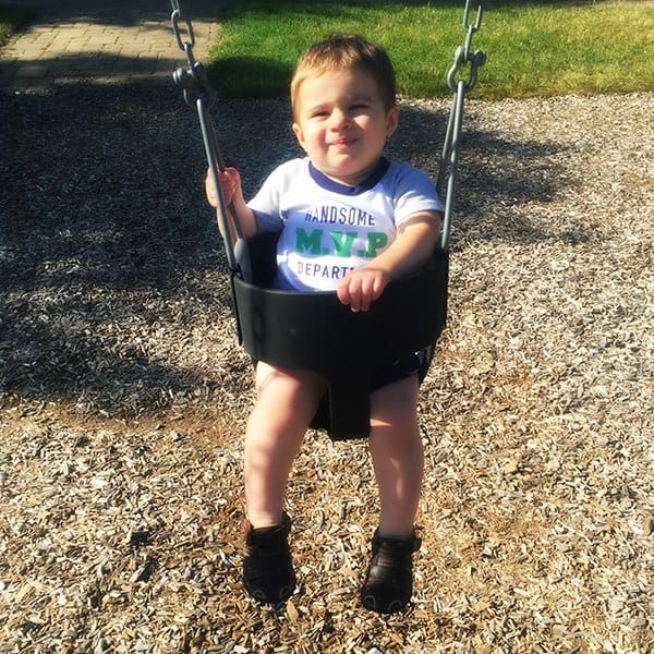 Joseph adores the swing!