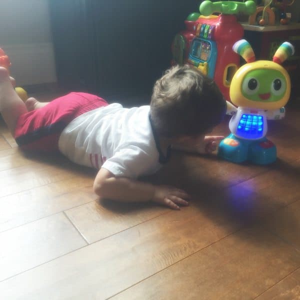 Joseph playing with his dancing robot