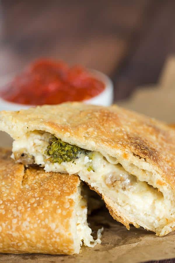 Simple, classic calzones made from an easy pizza dough and with an unlimited assortment of filling possibilities!