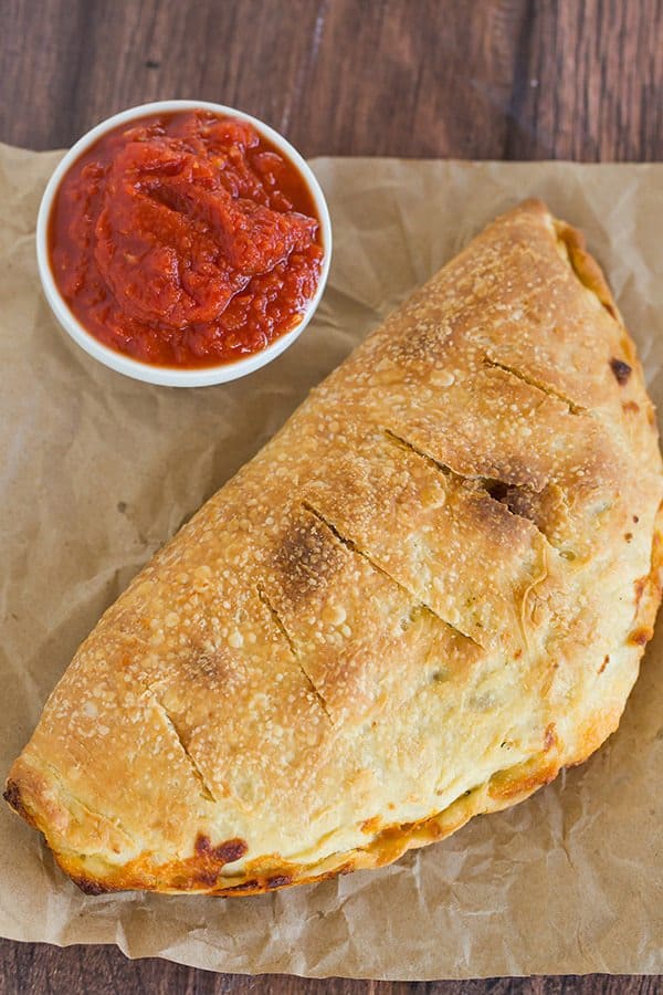 Simple, classic calzones made from an easy pizza dough and with an unlimited assortment of filling possibilities!