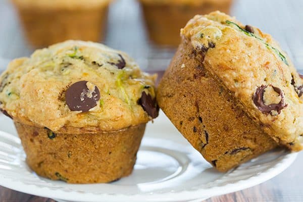 Zucchini-Chocolate Chip Muffins - A super quick and easy recipe, insanely moist, and a great way to use up the late summer zucchini bounty!