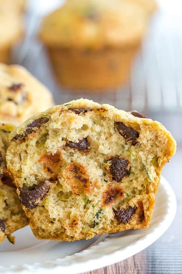 Zucchini-Chocolate Chip Muffins - A super quick and easy recipe, insanely moist, and a great way to use up the late summer zucchini bounty!