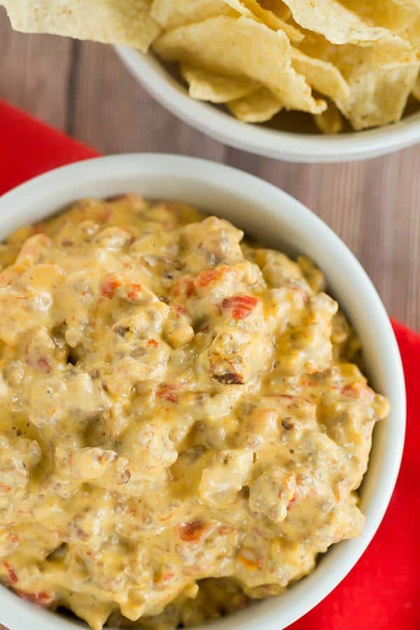 This game day dip is perfect football food - only 5 ingredients and you throw them all in the slow cooker! An easy, cheesy dip!
