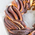 Chocolate Babka shaped into a braided wreath for the most decadent holiday breakfast (or dessert, or snack)! | browneyedbaker.com