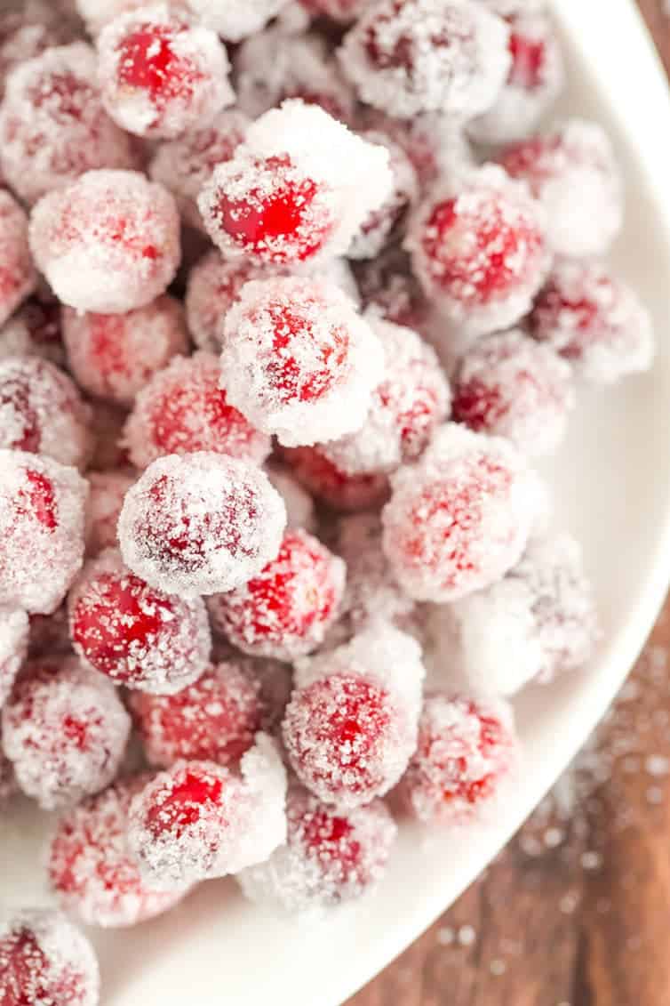 An easy recipe for sugared cranberries - a beautiful, sparkly garnish for your holiday desserts and cocktails! | browneyedbaker.com