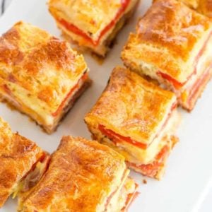 This easy antipasto appetizer bake features layers of Italian meats and cheese, sandwiched between layers of crescent dough. Great for parties!