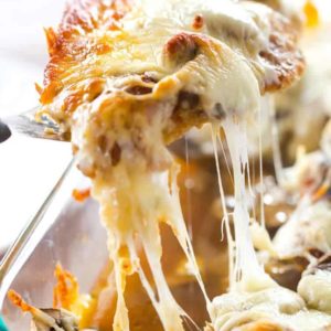 Cheesy Chicken with Mushrooms - Breaded chicken cutlets layered with sliced mushrooms and mozzarella. Easy dinner! | browneyedbaker.com