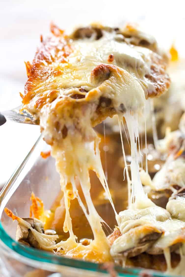 Cheesy Chicken with Mushrooms - Breaded chicken cutlets layered with sliced mushrooms and mozzarella. Easy dinner! | browneyedbaker.com
