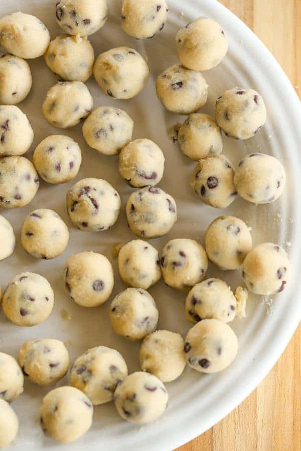 The best cheesecake recipe loaded with chunks of chocolate chip cookie dough and mini chocolate chips - a cookie dough lover's dream!