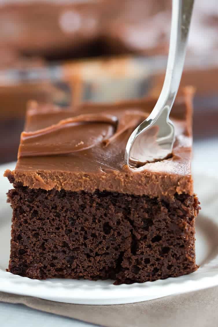 This fabulous chocolate sheet cake only requires one pot for mixing and is topped with the most amazing milk chocolate ganache frosting.