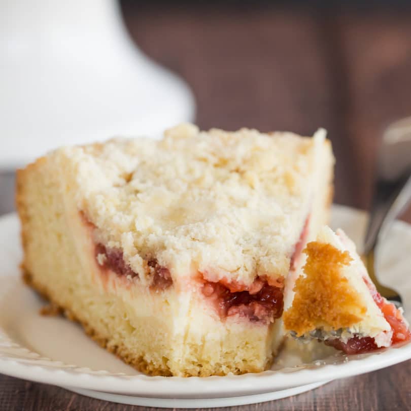 Strawberry Rhubarb Coffee Cake - A biscuit-like cake topped with a cream cheese filling and homemade strawberry rhubarb jam.