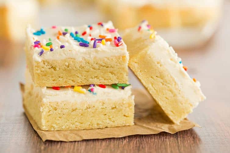 Three frosted sugar cookie bars.