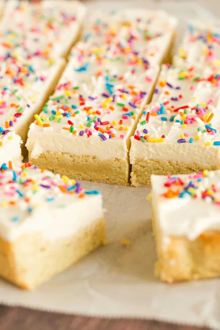 A pan of sugar cookie bars sliced into squares.