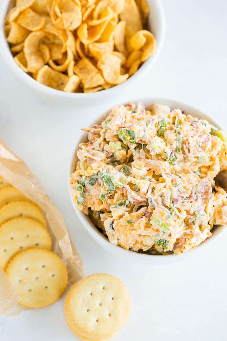 Neiman Marcus Dip - A quick and easy combination of bacon, cheddar, scallions, mayo, toasted almonds and hot sauce! 