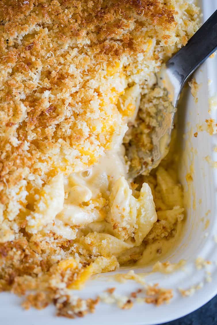 Taking a big scoop of Chrissy Teigen's Mac and Cheese