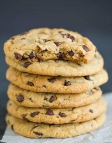 A big stack of soft and chewy chocolate chip cookies.