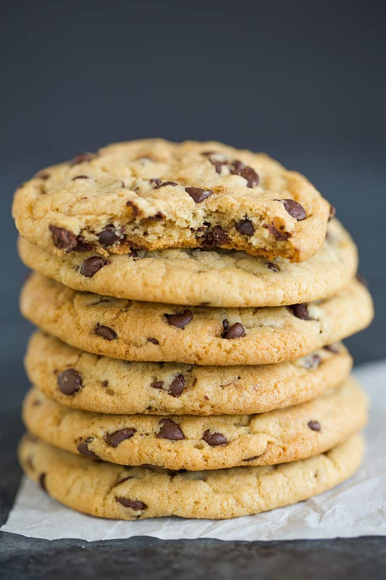 A big stack of soft and chewy chocolate chip cookies.