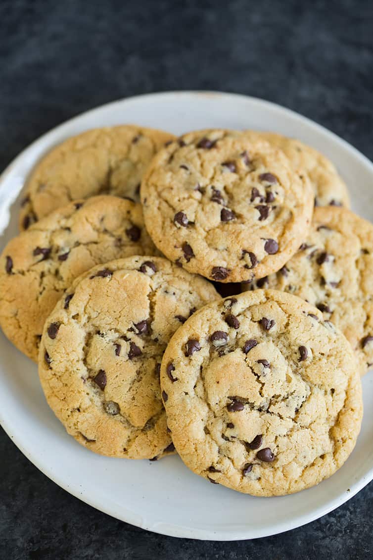 A big plate of soft and chewy chocolate chip cookies.