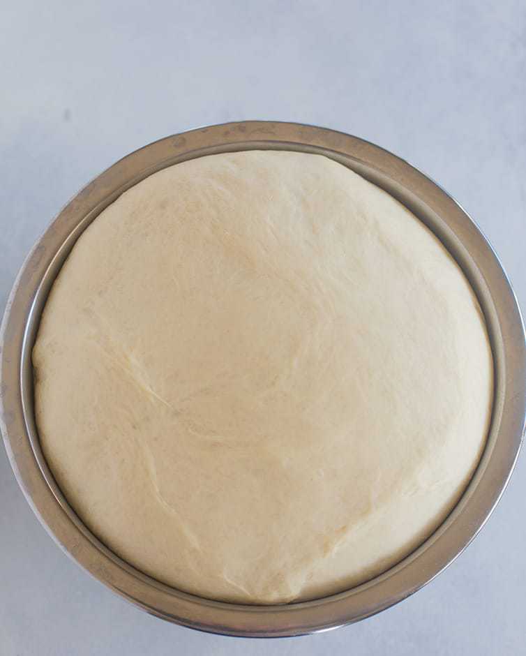 Milk bread dough after its first rise.