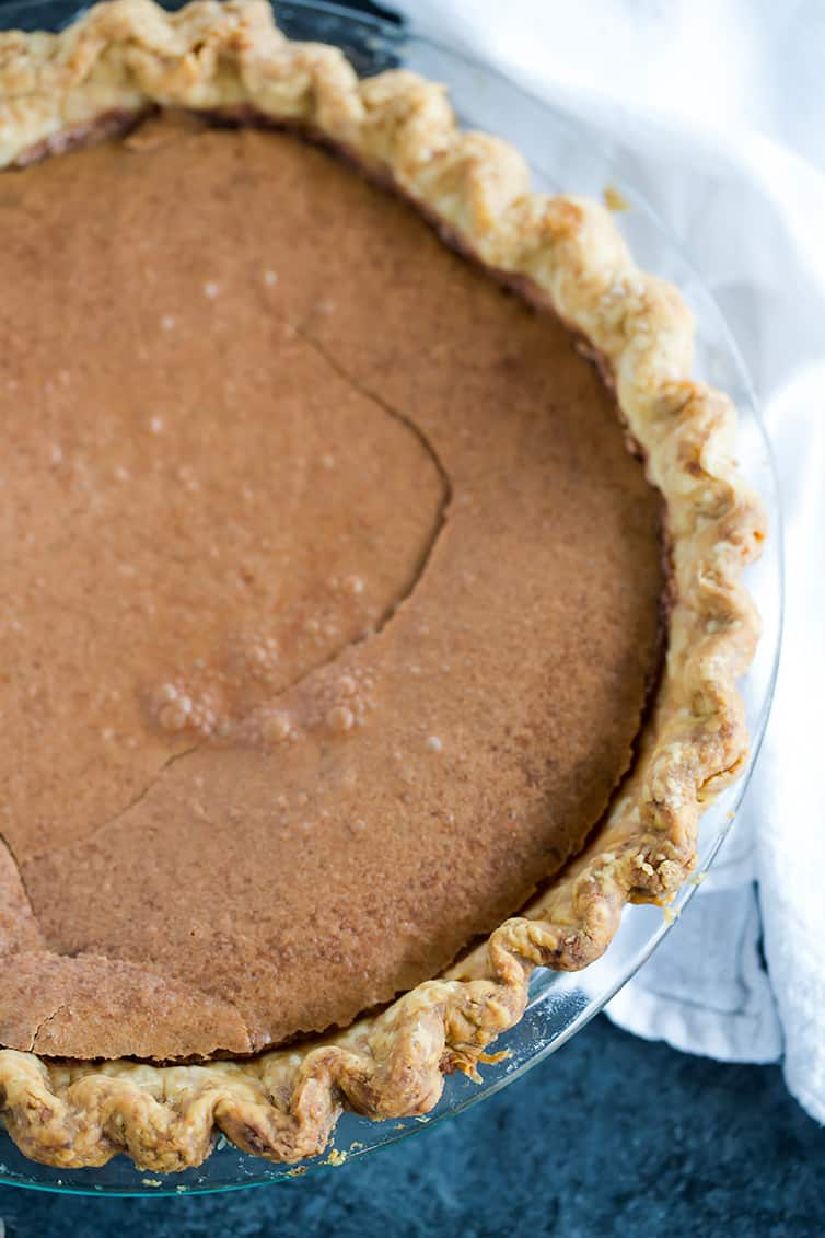 An overhead view of a baked chocolate chess pie.