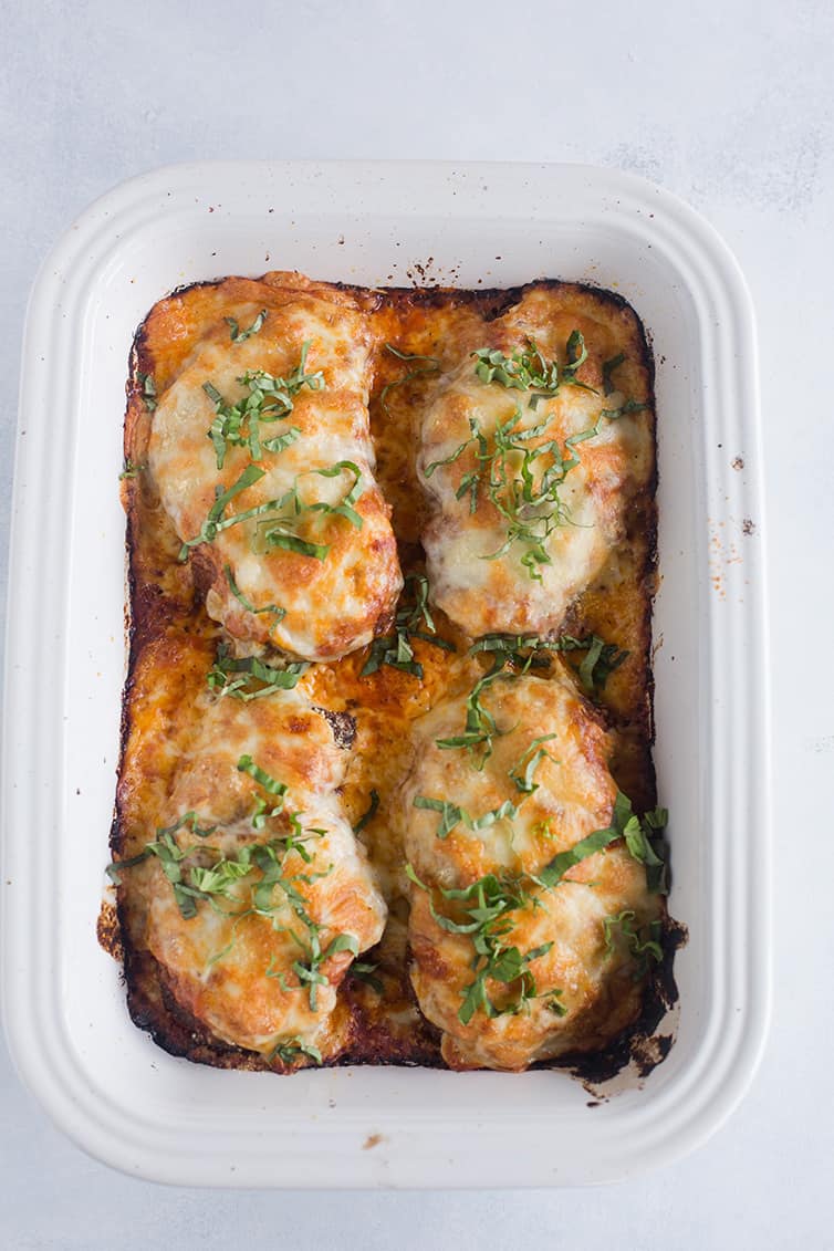 A pan of baked chicken parmesan.