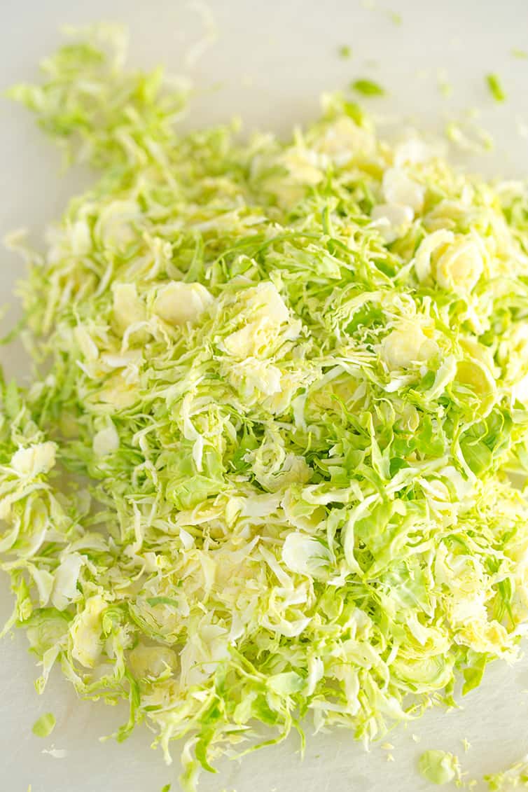 A pile of shaved Brussels sprouts.